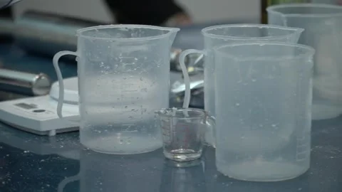 Measuring Ingredients in the Kitchen Stock Footage 317472541