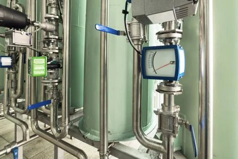 Measuring instruments in the pipeline system of filtering equipment. Stock Photos