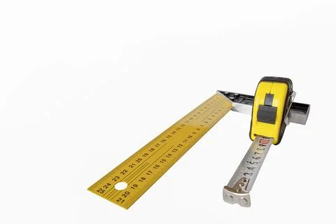 Measuring instruments on a white background. A working tool. Construction and Stock Photos