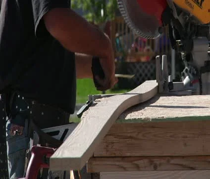 Measuring lumber for cutting Stock Footage 21565052