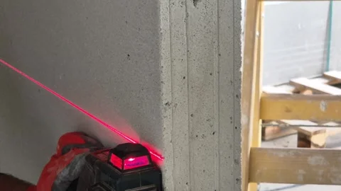 Measuring New Wall Panel Using Professional Laser Level Tool 库存影片 332932078
