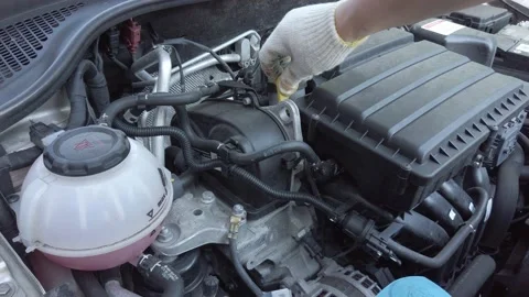 Measuring the oil level in the car engine Stock Footage 155673586