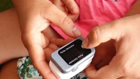 Measuring oxygen saturation with pulse oximeter. Covid 19 prevention Video stock 207027005