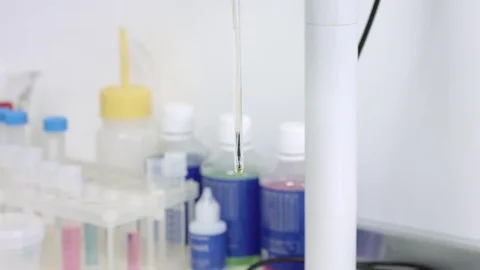 Measuring ph with digital ph meter Stock Footage 70808432