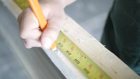 Measuring a piece of wood Stock Footage 121167908