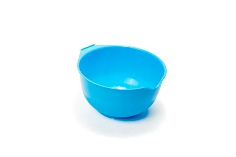 Measuring plastic cup isolated on white background. Stock Photos