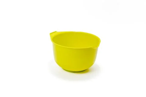 Measuring plastic cup isolated on white background. Stock Photos