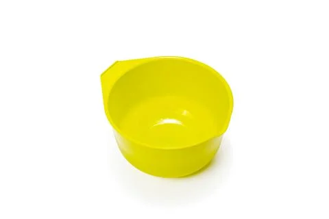 Measuring plastic cup isolated on white background. Stock Photos