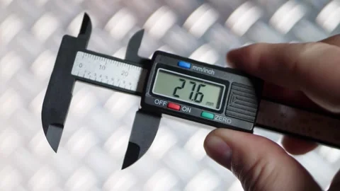 Measuring Precise Dimensions with a Caliper Tool 스톡 동영상 308331981