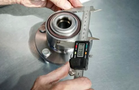 Measuring the radius of the hub Stock Photos