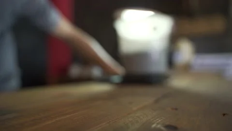 Measuring roasted coffee beans Stock Footage 196663104