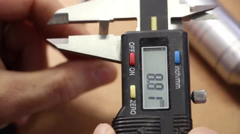 Measuring silver blank for ring by electronic vernier calliper, workshop jewelry Video stock 56316164
