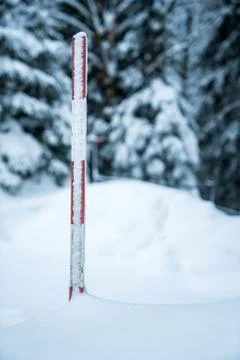 Measuring the snow depth with ruler Stock Photos