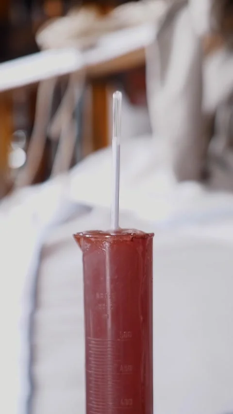 Measuring Sugar Levels with a Hydrometer. Accuracy of alcohol content in wine Stock Footage 315366892