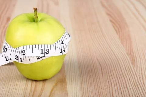 Measuring tape on Apple Stock Photos