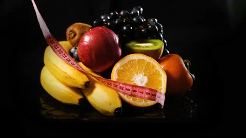 Measuring Tape Falling on Fresh Organic Fruits 스톡 동영상 144716306