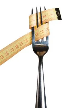 Measuring tape on a fork Stock Photos