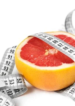 Measuring tape with grapefruit Stock Photos