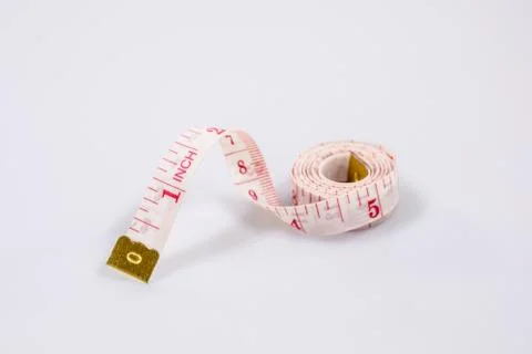 Measuring tape isolated on white background. Stock Photos