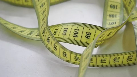 The measuring tape lies on the table. Video stock 130827888