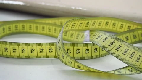 The measuring tape lies on the table. Video stock 130829058