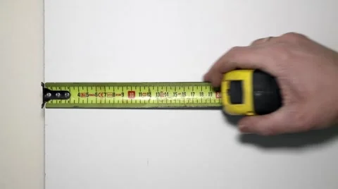 Measuring  with a tape measure Stock Footage 46669737