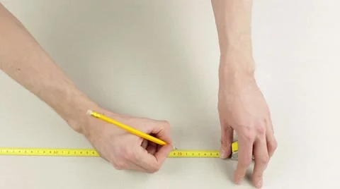 Measuring with a tape measure 스톡 동영상 60406621