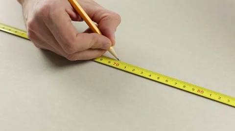 Measuring with a tape measure 스톡 동영상 60406628