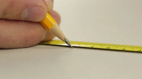 Measuring with a tape measure Stock Footage 60406632