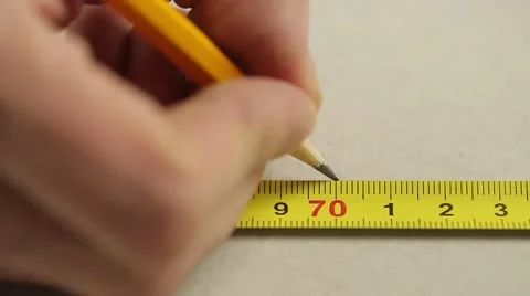Measuring with a tape measure 스톡 동영상 60406633