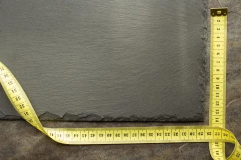 Measuring tape on table Stock Photos