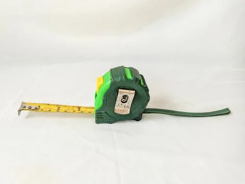 Measuring tape tool on white surface Stock Photos