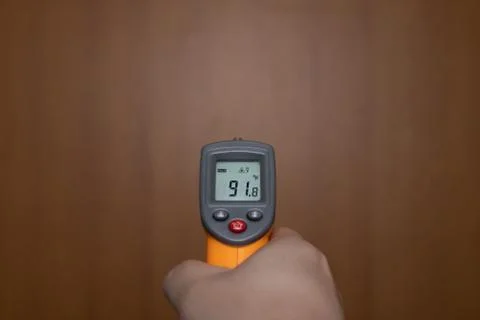 Measuring temperature with digital thermometer Stock Photos
