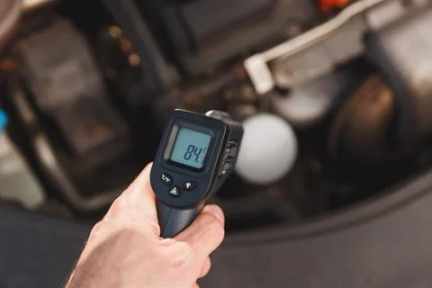 Measuring temperature of internal combustion Engine turbine by laser infrared Stock Photos