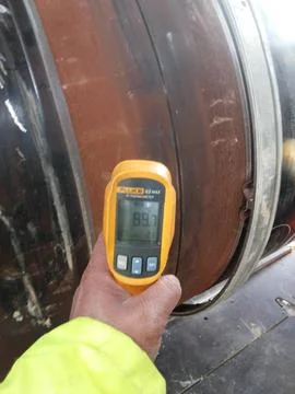 Measuring temperature of laser processing workpiece via thermocouple Stock Photos