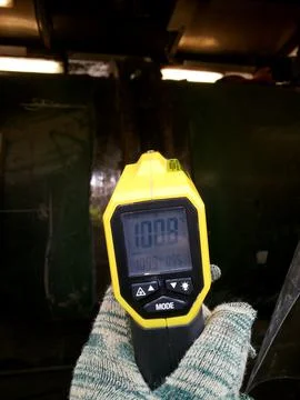 Measuring temperature of laser processing workpiece via thermocouple Stock Photos