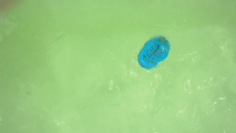 Measuring The Temperature Of The Water In The Bath Stock Footage 116202192