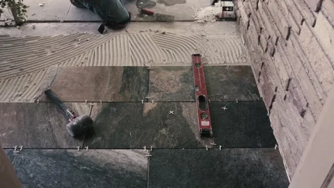 Measuring the Tiles Stock Footage 288663393