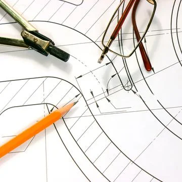 Measuring tools scattered in the drawing, engineering work on the project Foto stock