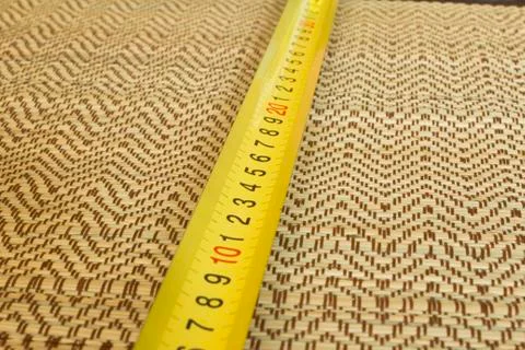 Measuring tools on a straw background. Fotos Stock