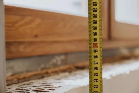 Measuring window for future window sill Stock Photos