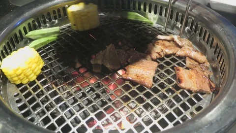 Meat and corn on the fire Stock Footage 70544866