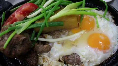 Meat and grilled eggs Stock Footage 78401107