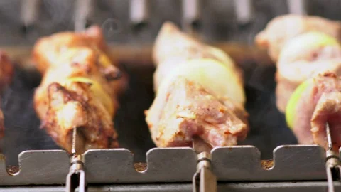 Meat and vegetables kebabs on grill in close-up Stock Footage 118892452