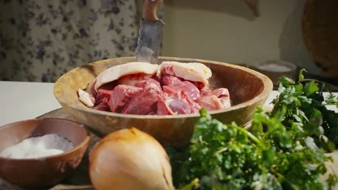 Meat and vegetables on kitchen table Stock Footage 138192581