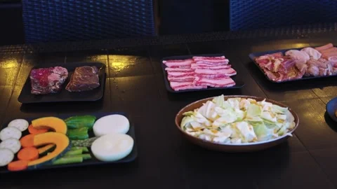 Meat and Vegetables Laid Out For Barbecue, Wagyu, Chicken, Cabbage, Pumpkin Video stock 338080620