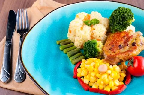 Meat and vegetables Stock Photos