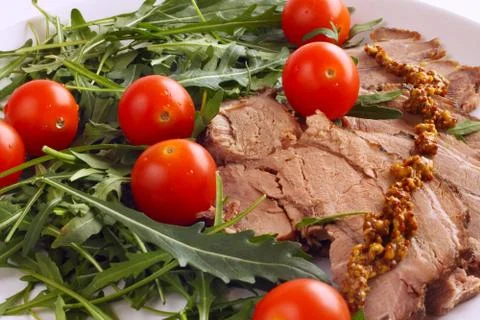 Meat and vegetables Stock Photos