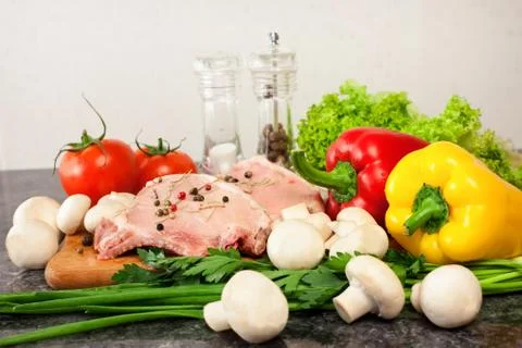 Meat and vegetables Stock Photos