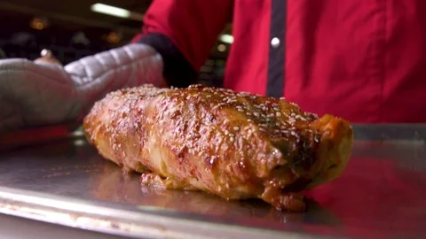 Meat on a baking sheet from the oven Stock Footage 119300702
